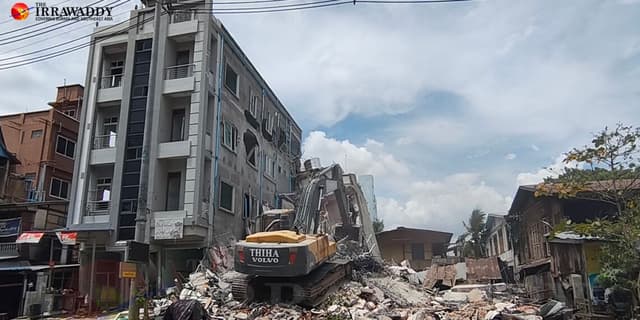 A damaged home is being demolished in Mandalay. / The Irrawaddy